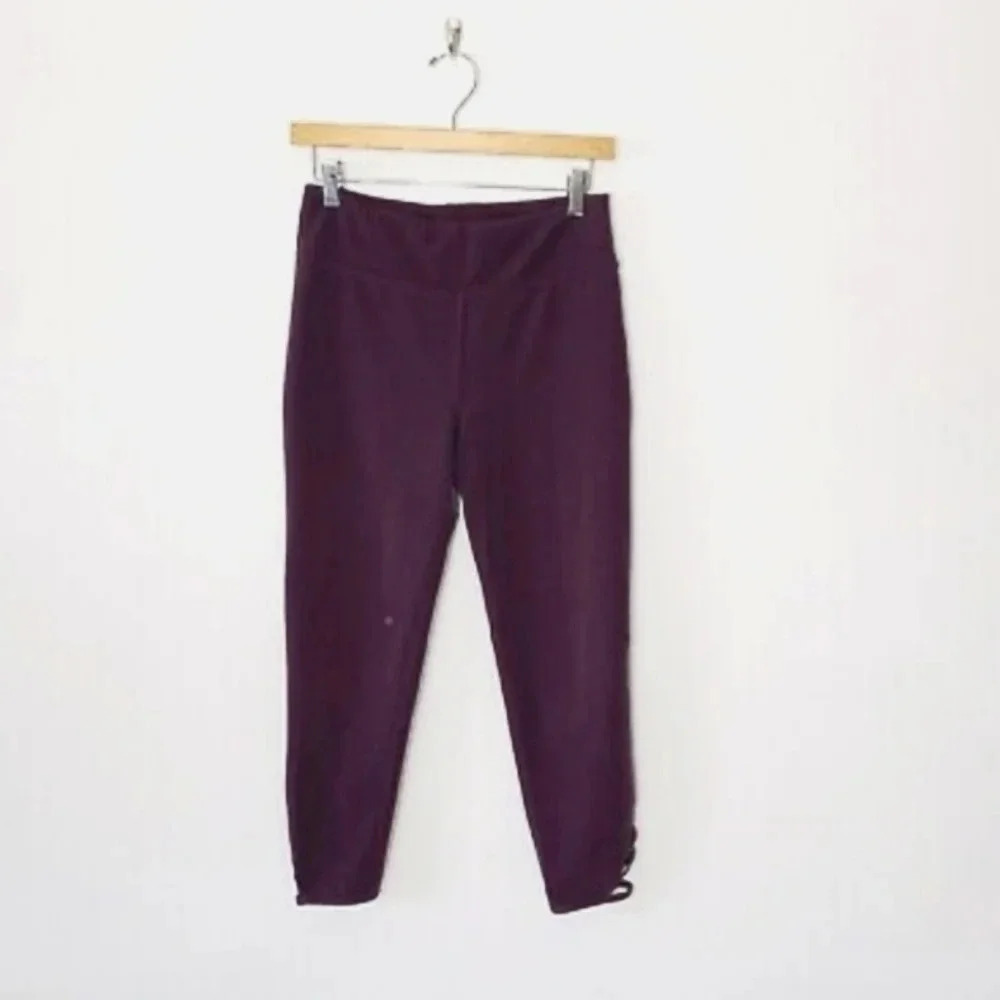 Free People Movement purple Lotus cross-cross cropped activewear leggings